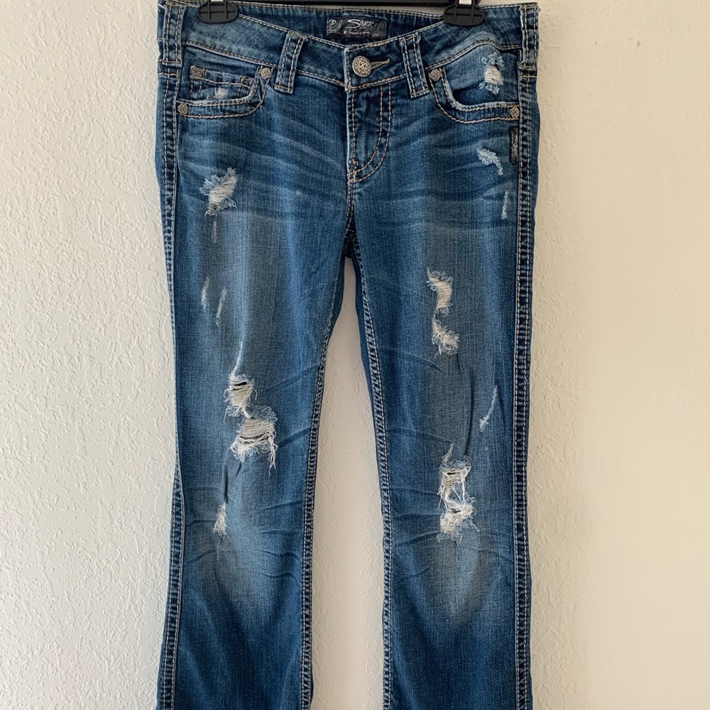 Medium wash boot cut Silver Jeans